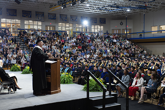 speaker at podium at commencement