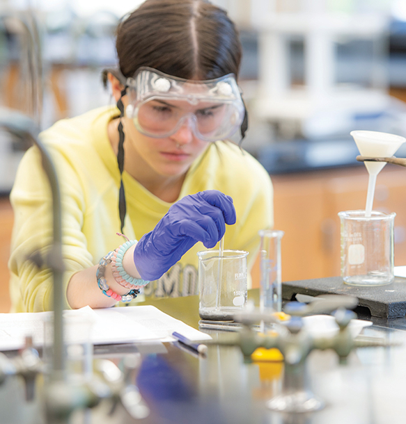 chemistry student in lab