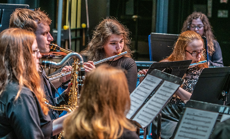 University Theatre ensemble performing on University Theatre stage.