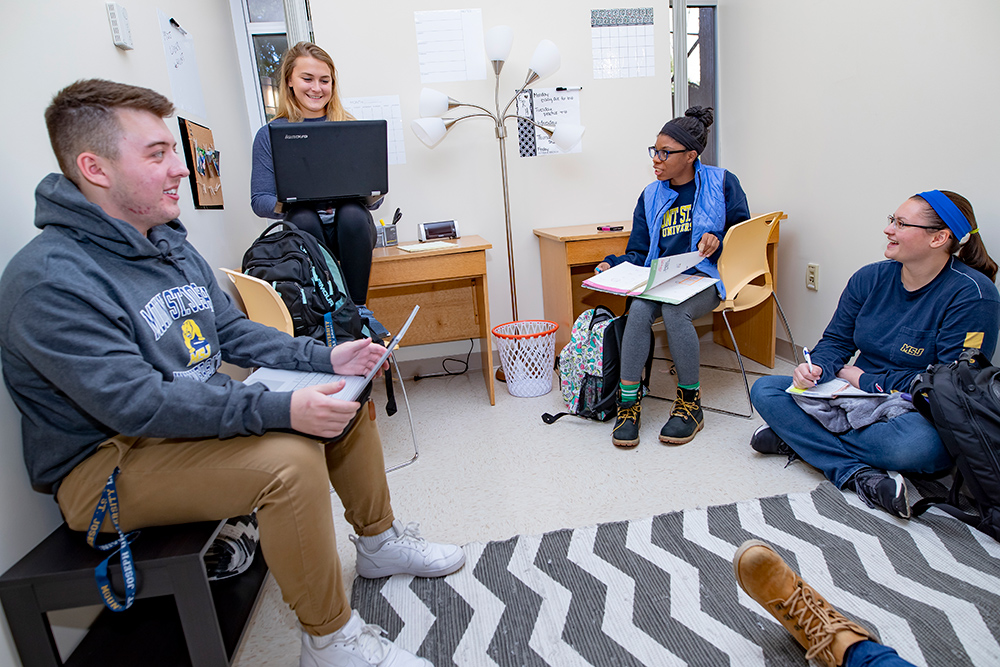 students in dorm room